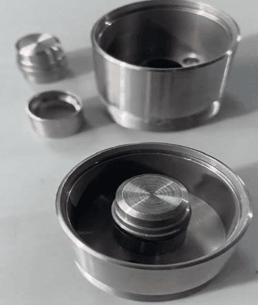 Vacuum brazing of carbon steel with stainless steel