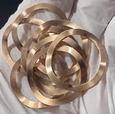 Heat treatment of phosphor bronze springs